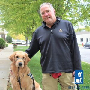 Man with a service dog