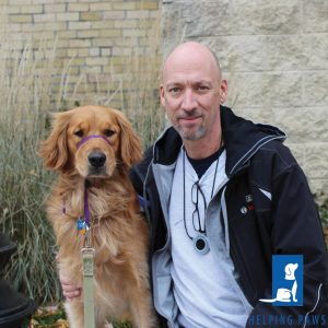Service dog and a man.