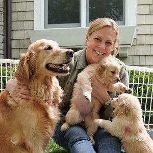 Women with three dogs